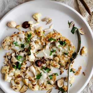 Cauliflower Steaks With Chickpeas & Herby Tahini Sauce