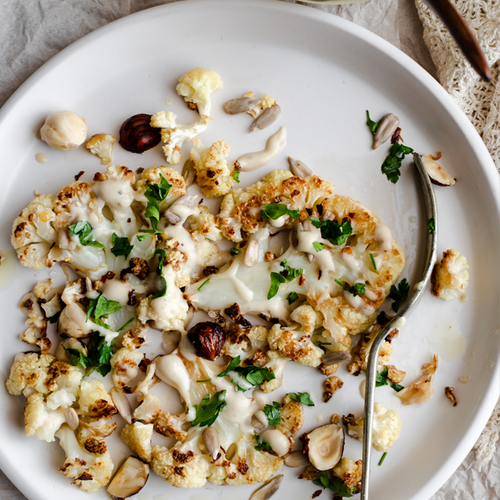 Cauliflower Steaks With Chickpeas & Herby Tahini Sauce