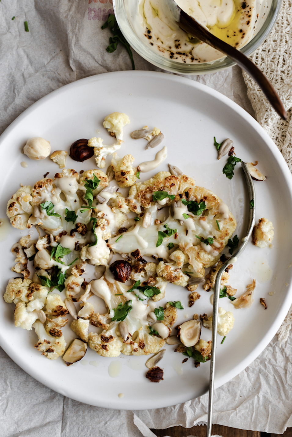 Cauliflower Steaks With Chickpeas & Herby Tahini Sauce
