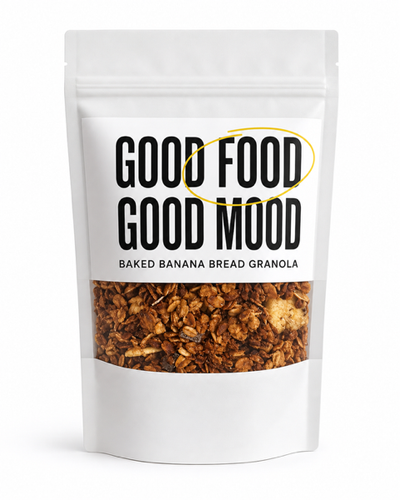 Bag of baked banana bread granola with 'Good Food Good Mood' label on a white background